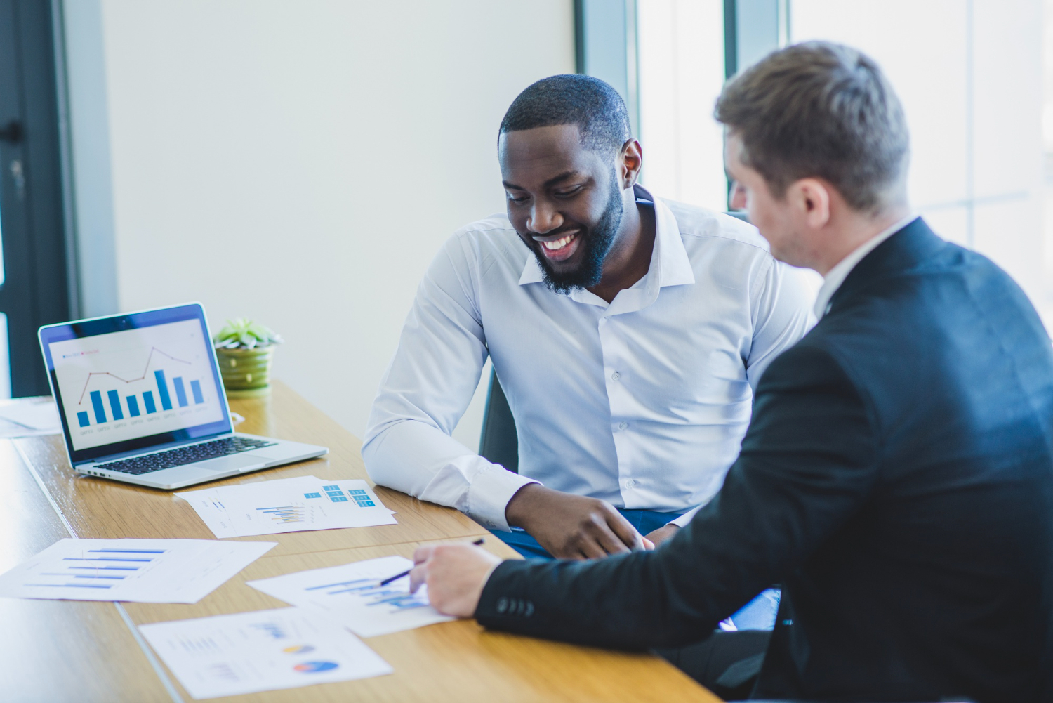 Business men at a desk