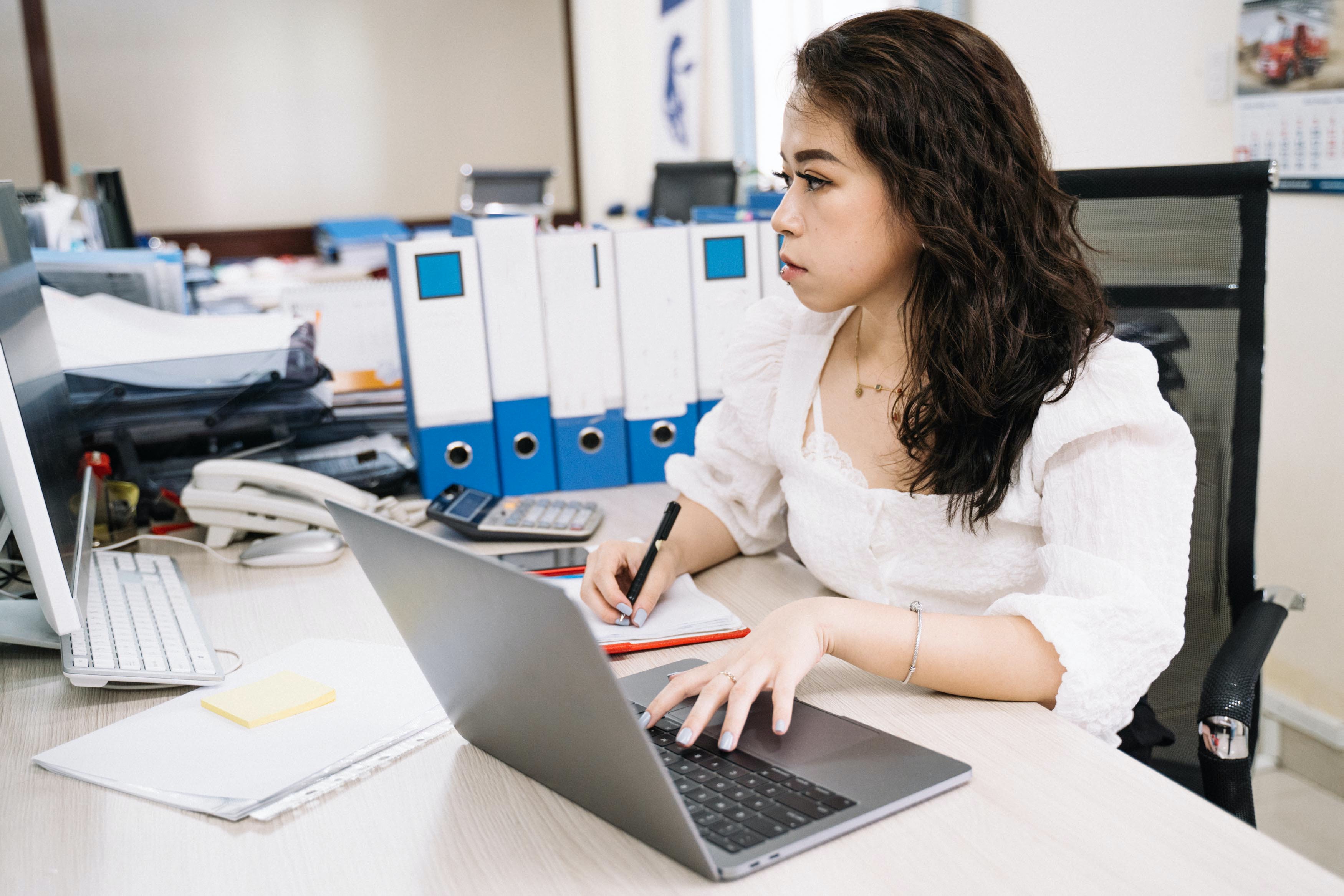 Financial officer sat at desk