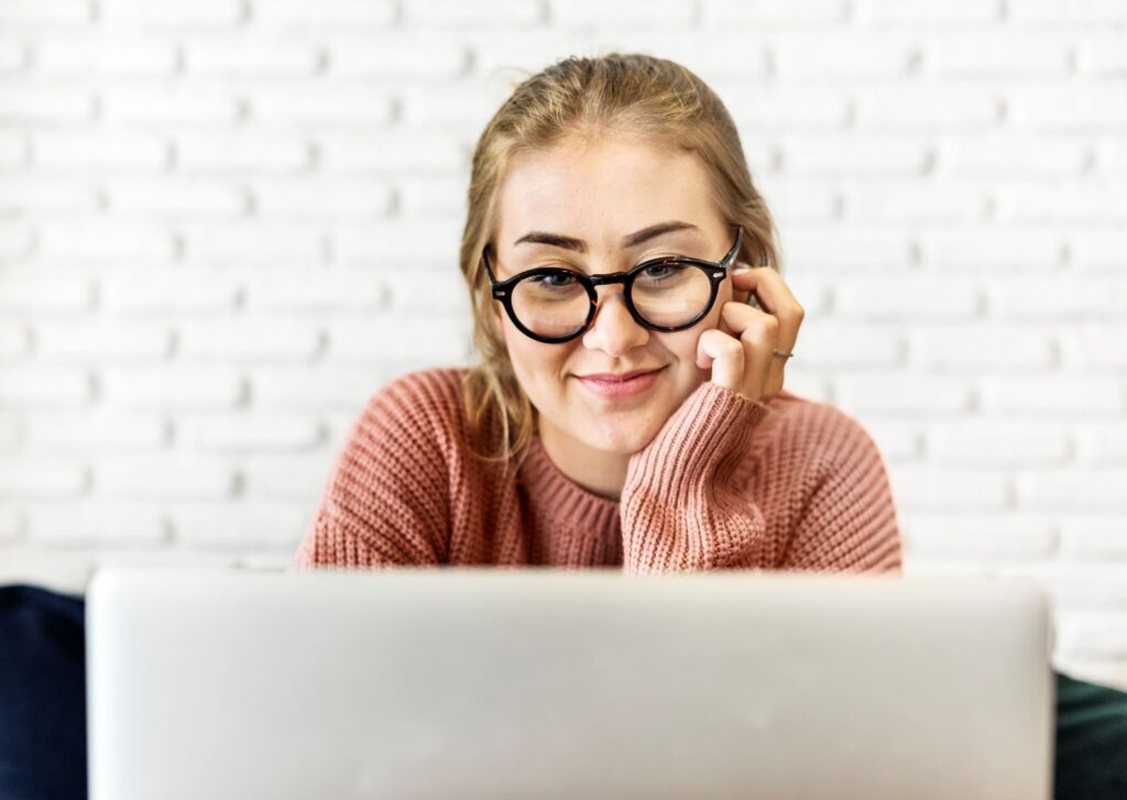 Confident young learner completing a stress management online training course. 